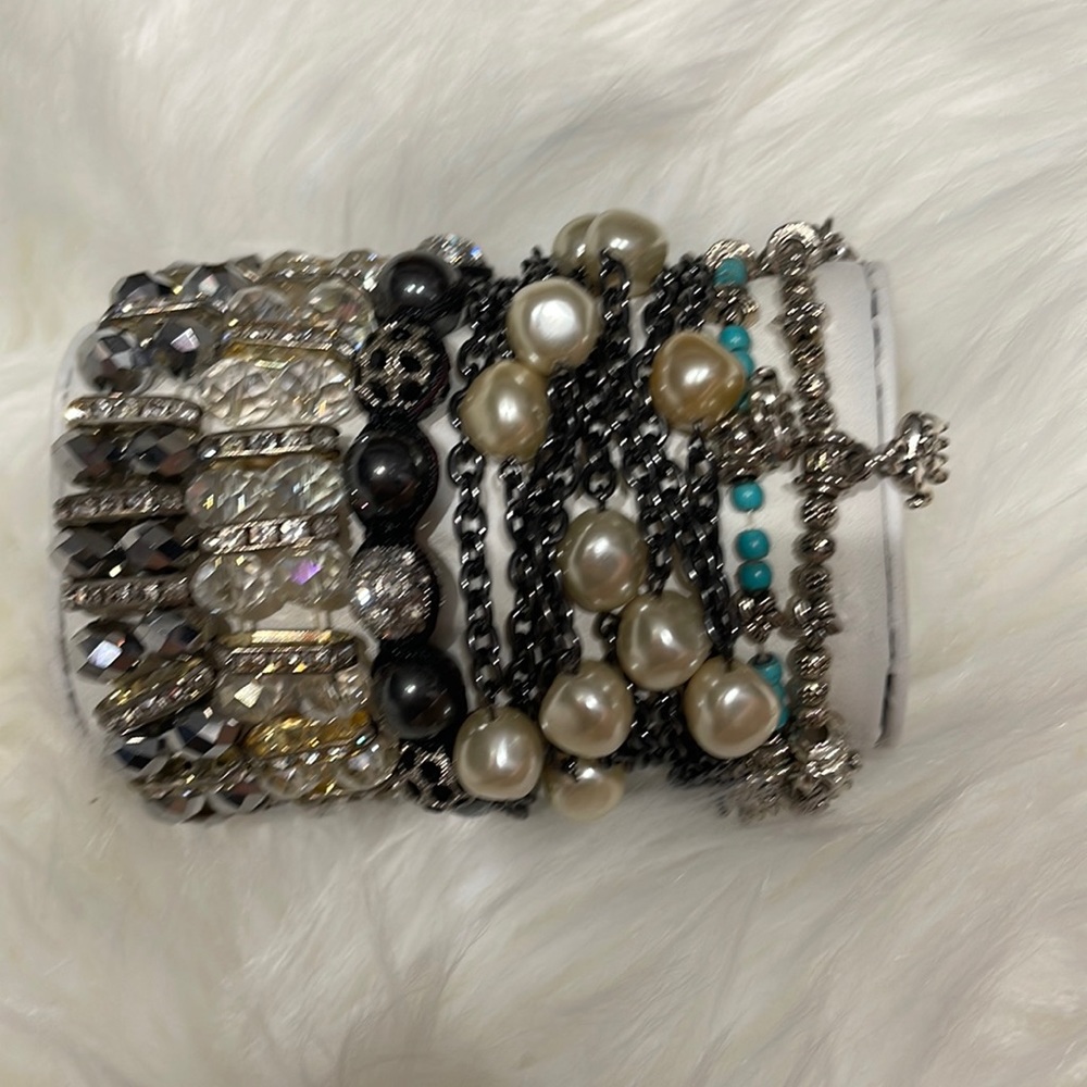 8 glass and stone beaded bracelets.